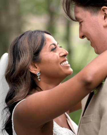 A bride and groom embracing