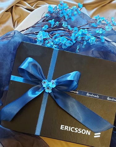 Beautifully packed black and blue box for Ericsson Pakistan. Hand-painted pen holders corporate gifts