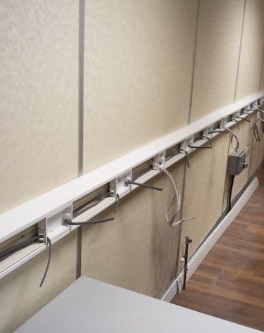 Commercial dado trunking and electrical wiring installation in a Dartford business unit