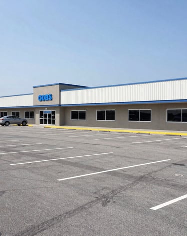 Wide shot of a clean apartment complex exterior after pressure washing