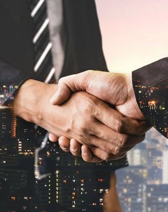 Handshake representing client trust - startup business advice | legal assistance