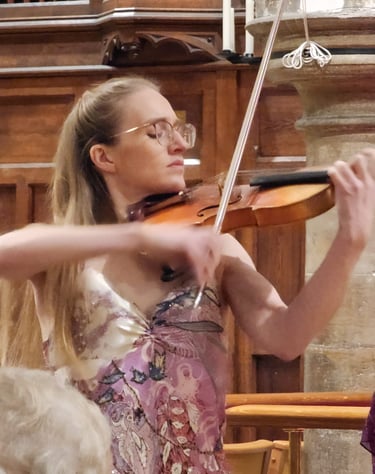 Charlotte Rowan, violinist performing live in Canterbury