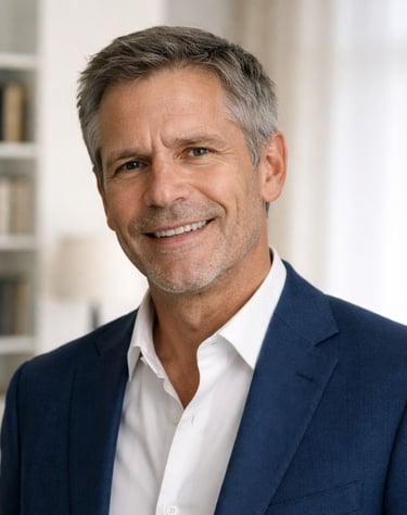 a man in a suit and white shirt