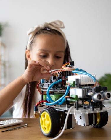a girl is playing with a robot