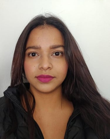a woman with long hair and a pink lipstick
