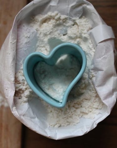 heart shape cutter on flour