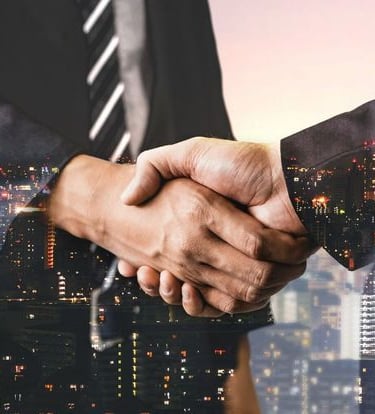 Handshake representing client trust - startup business advice | legal assistance