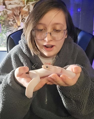 a girl holding a shake 