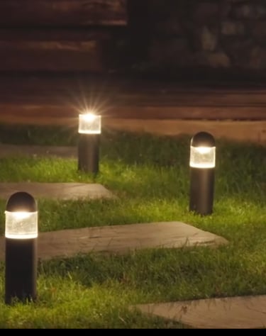 soft warm glowing pathway lights illuminating walkway.