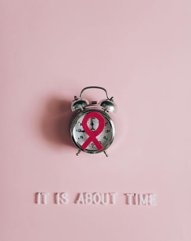 a clock with a ribbon around it and a ribbon around it. breast cancer awareness