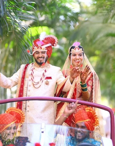a man and woman in traditional indian wedding attire