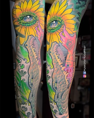 tatuaje cocodrilo, ojo, mano, girasol neotradicional
