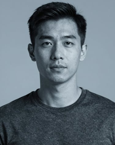 Clean, minimalist portrait of a man with tech-wear details, lighting creating a blue tint #98C1D9, premium studio quality produced by AI.