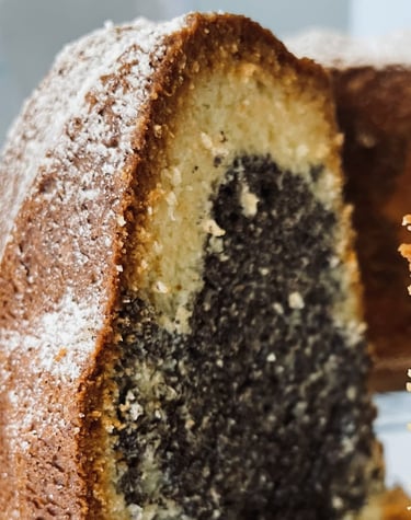 a marble cake with a slice taken out of it