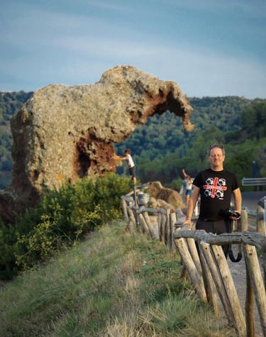 Franco Prisco at Roccia dell’Elefante in Castelsardo, Sardinia, with UNESCO-listed domus de janas.