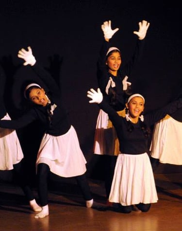 Group of mime artists performing a act using facial expressions and body movemen of kalpangan
