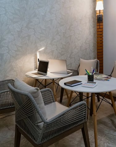 a table with a laptop and a laptop on it