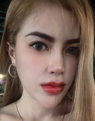 face and shoulder shot of lady with red lipstick