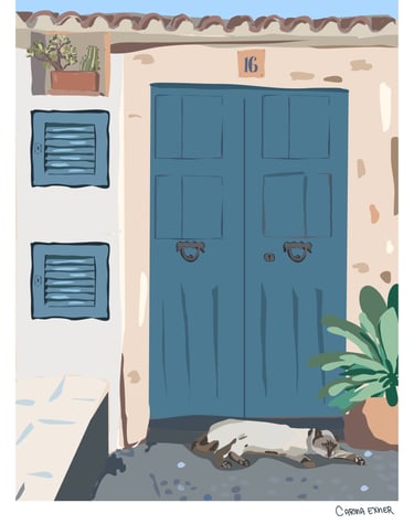 a cat laying on the ground in Banyalbufar Mallorca 