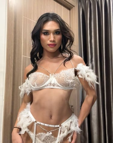 Sexy ladyboy wearing white lingerie