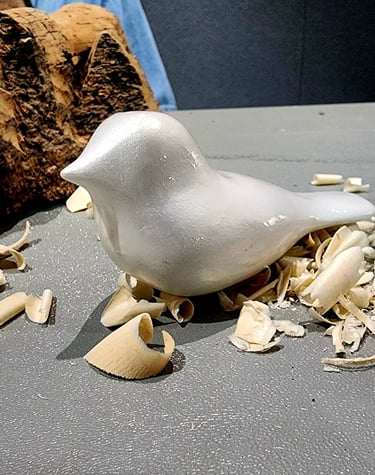 comfort bird hand carved by Tom Anstett