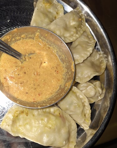 Making momos by tourists in Thakurdwara