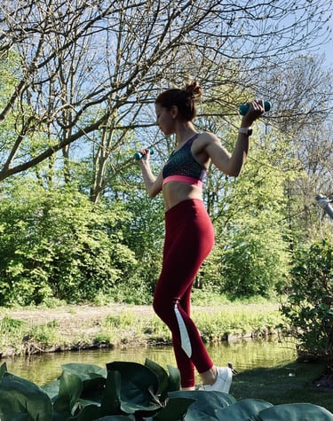 a woman in a sports bra top and leggings