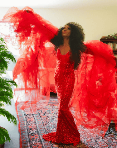 a woman in a red dress, Racquel Marshall as Diana Ross