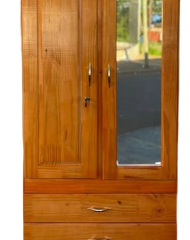 a wooden armoire with a mirror and a mirror