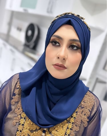 Modern navy blue hijab makeup and styling by Maria Padela.