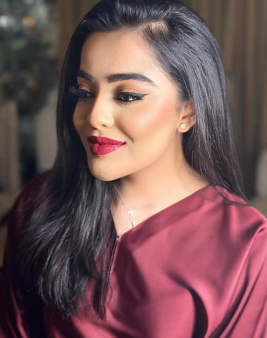 a woman with long hair and a red dress, party makeup dubai