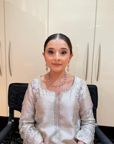 Elegant white bridal makeup look by Maria Padela Dubai