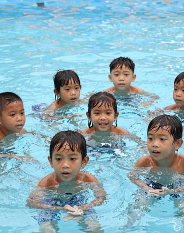 Gray square placeholder graphic with a white cross and central text for website design layout.