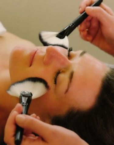 woman receiving  gentle face brushing