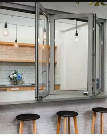 Cerramiento Plegable sobre pequeño mostrador cocina.