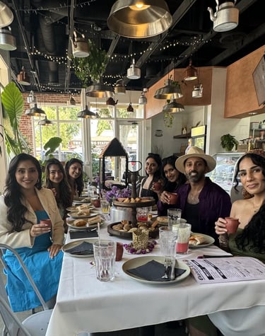 A group of desis enjoying Bollywood Afternoon Tea and Chai