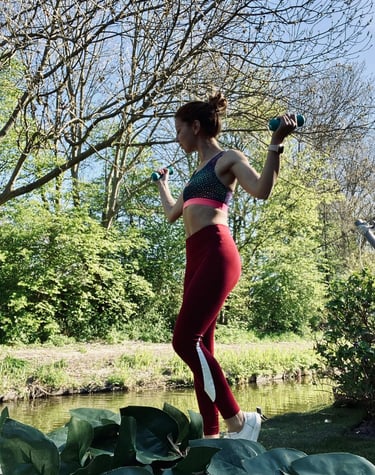 a woman in a sports bra top and leggings