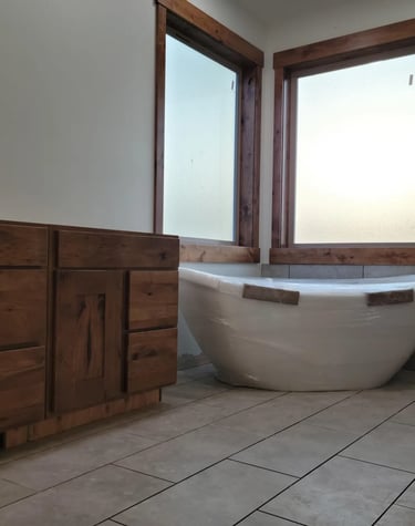 Custom bathroom with corner windows in this luxury home build