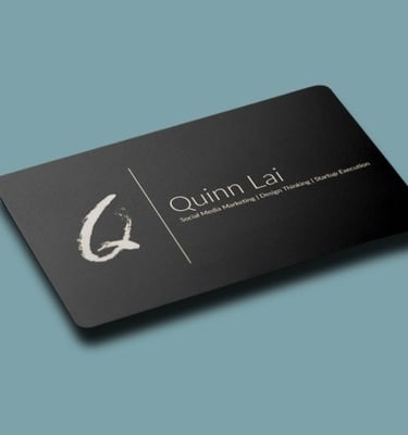 Black NFC card with Quinn Lai design and a logo