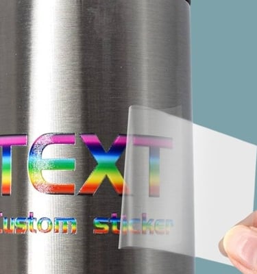 UV sticker that spelled "text" is applied to a silver tumbler