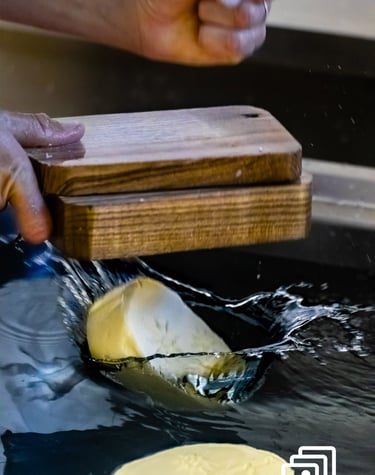 a person is making a butter