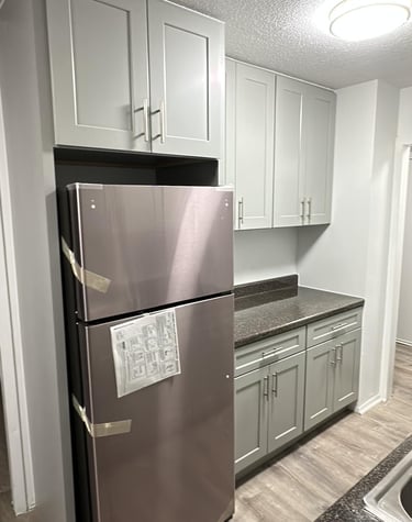a refrigerator with a refrigerator and a refrigerator freezer