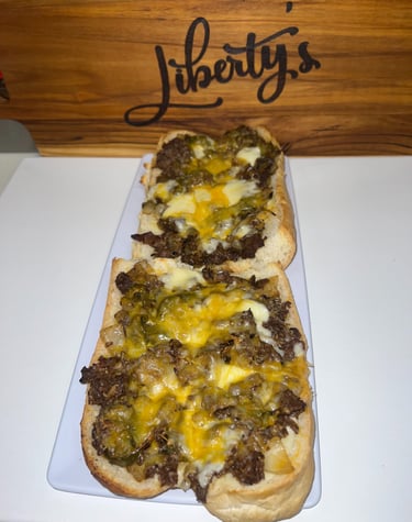 Philly steak and cheese with liberty sign
