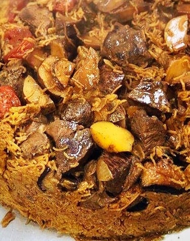 maqluba delicious seasoned rice with meat, potatoes, eggplant