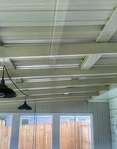 Back porch repair in Tyler, TX after storm caused a tree to fall on roof and porch