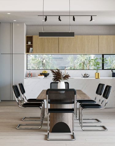 Une salle à manger avec une table et des chaises