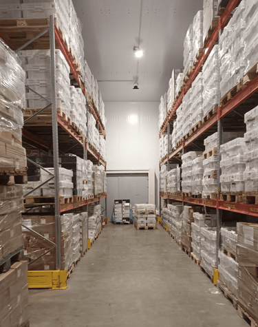 a warehouse warehouse with a lot of boxes of boxes
