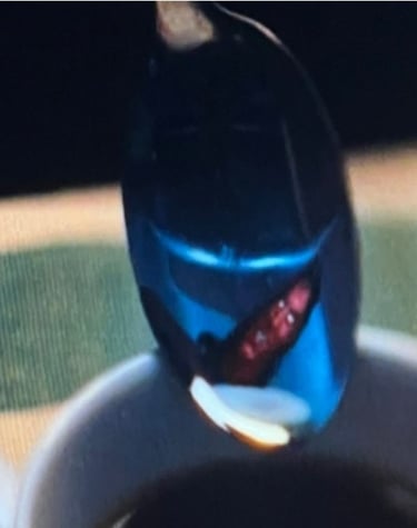 image of demon in reflection