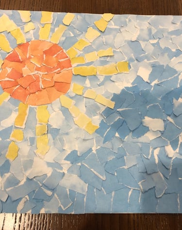 Collage made from torn paper by Heather Suto titled "Sun and Sea". 