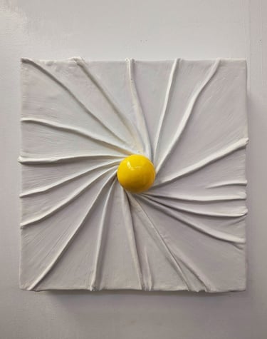 a yellow sphere in the middle of radiating plastered fabric